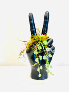 Large black peace hand